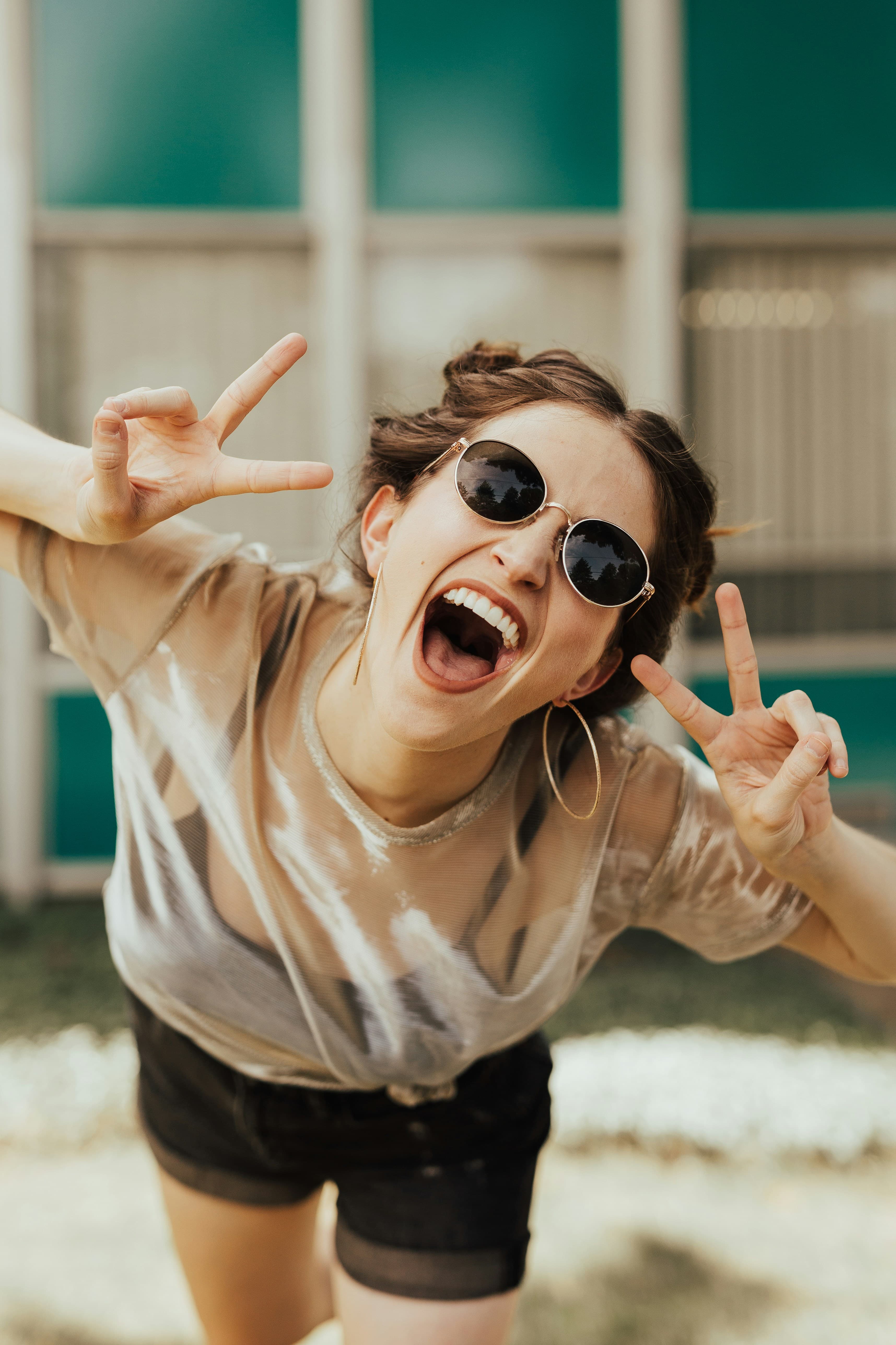 Photo by <a href="https://unsplash.com/@brookecagle?utm_content=creditCopyText&utm_medium=referral&utm_source=unsplash">Brooke Cagle</a> on <a href="https://unsplash.com/photos/selective-focus-photography-of-jolly-woman-using-peace-hand-gesture-oTweoxMKdkA?utm_content=creditCopyText&utm_medium=referral&utm_source=unsplash">Unsplash</a>